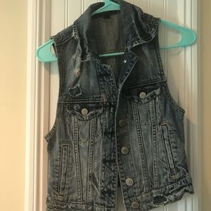 Distressed denim vest